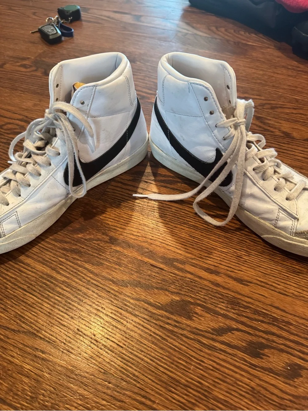 Nike Blazer White High-Top Sneakers with Black Swoosh Woman 11
